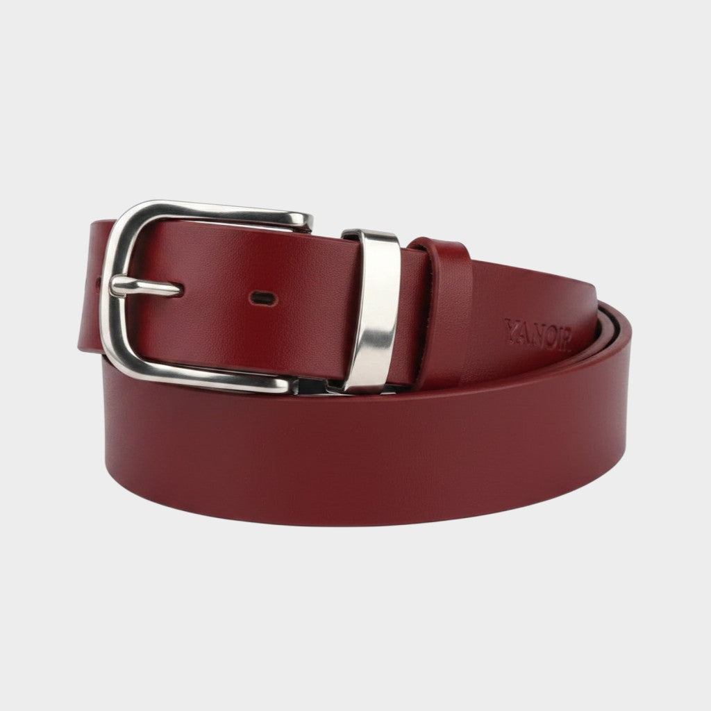 MODISTIAZ classic black genuine leather belt with polished silver buckle, smooth finish, and subtle embossed detail.