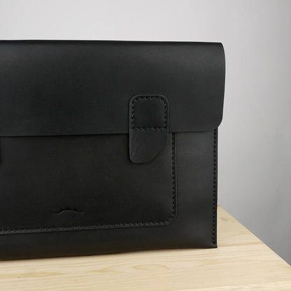 MODISTIAZ black leather document folio with snap closure and exterior pocket, perfect for business use.