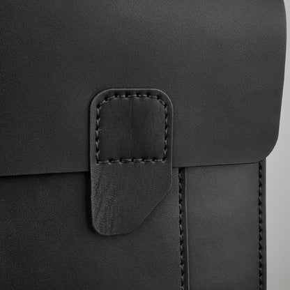 MODISTIAZ black leather document folio with snap closure and stitched detailing.